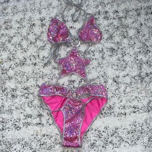 Bright pink and silver reflective one piece. Size Small